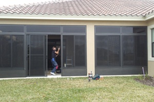 House 2 - Backyard View of Exterior Acrylic Doors