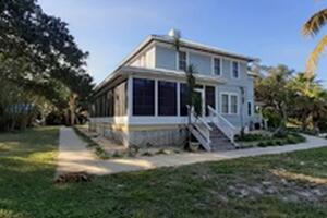 Vinyl Window Sunroom on Wrap Around Porch in Merritt Island