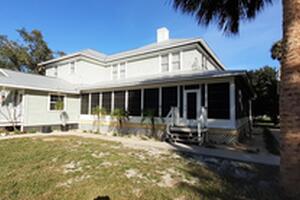 Vinyl Window Sunroom on Wrap Around Porch in Merritt Island