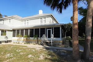 Vinyl Window Sunroom on Wrap Around Porch in Merritt Island