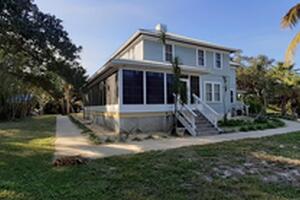 Vinyl Window Sunroom on Wrap Around Porch in Merritt Island